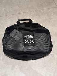 The north face x kaws duffle bag