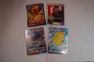 噴火龍 Charizard V / 肋骨海龜 Carracosta GX / 冲浪比卡超 Surfing Pikachu Vmax / 火箭隊老大 阪木 Giovanni's Exile Traine