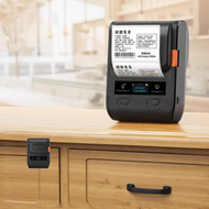 DTPrinter | เครื่องพิมพ์ฉลากความร้อนแบบพกพา Bluetooth พร้อมฉลากสีเงินและการติดฉลากด้วย QR Code อย่าง