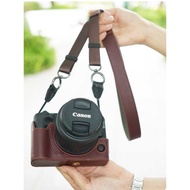 Suitable for Canon Canon R50V Camera Bag R50v Camera Camera Bag Base Protective Leather Case Half Ca