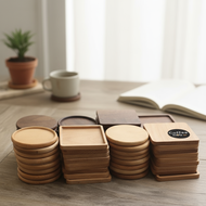 A wooden square round cup pad that is heat resistant and non-slip, perfect for use as a coaster or d