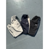 AirRoom 2025AW 9090 X umbro Nylon Pants Joint Sports