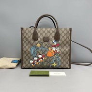 Gucci古馳Disney唐老鴨印花老花托特包肩背包