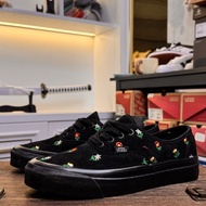 Vans black fabric with small floral pattern low cut casual shoes