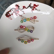 Wholesale of 12 flower bang clips with lovely crystal stones