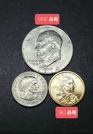 不同年代美金一元共3枚  包括一枚1974年的艾森豪威爾一美元硬幣(接近全新)，一枚1979年的蘇珊·B·安東尼一美元硬幣，以及一枚2000年的薩卡加維亞一美元銅幣(全新品相強車輪轉光)