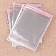 Plastik OPP Lem Seal  isi 100pcs Ukuran 6x18 7x24 12x12 12x24 13x18 15x20 OPP 25x35