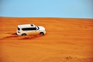 สถานที่ท่องเที่ยว/กิจกรรม ขี่อูฐในทะเลทรายดูไบ 4x4 Dune Bashing, Sand-boarding, Dinner ATV Vip Table