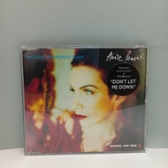 #F212-79 CD TERPAKAI [ ANNIE LENNOX - WALKING ON BROKEN GLASS ] USED CD #F212-79