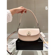 C Cowhide Camellia White Rotating Lock Emmy Saddle Shoulder Bag Handbag Cross-body Bag Female Bag Bi
