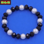 White bracelet with 8 cups of faceted black crystal CTNTTRFLEGH8