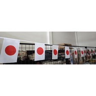String flags decorated with Japanese/Korean/Vietnamese countries