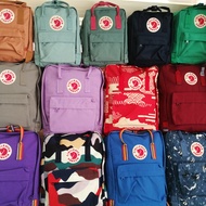 [CLASSIC 16L] Fjallraven Kanken ผ้าใบกระเป๋านักเรียน Causal กระเป๋าคลาสสิคกระเป๋าถือทุกเพศกระเป๋าเป้สะพายหลัง fit 14inch laptop