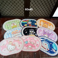 Oval doormat with hello kitty, doraemon, keropi, etc. characters