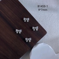 Set of 2 nail charms with bow nails A16