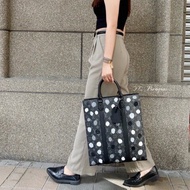 LV 草間彌生聯名款黑原花圓點琴譜包 M46404