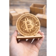 Bitcoin-shaped wooden coin