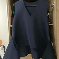 Peggy Hartanto navy top