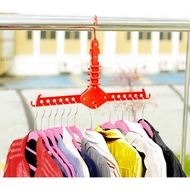Foldable clothes hanger to prevent movement and save space