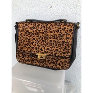 Fossil leather sling bag