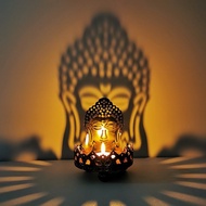 Candlesticks projecting Buddha's light on the altar