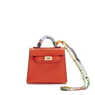 Hermès Capucines Tadelakt Micro Mini Kelly Twilly Charm Gold Hardware, 2021