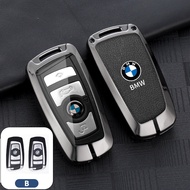 ที่หุ้มกุญแจหนังเคสกุญแจรถยนต์สังกะสีผสม E60 BMW หุ้มทั้งหมดป้องกันการล็อคปีนเขากันร่วงเคสสมาร์ทคีย์ป้องกันการ E84สำหรับ BMW E36 E46 E30 E90 F10 F30 E39 X1 F25 X3 E83 X5 X7 F15