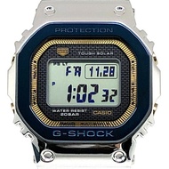 卡西歐 G-SHOCK 手錶 GMW-B5000SS-2 50週年紀念款,全金屬錶殼,電波太陽能藍牙,LED背光,藍色IP鍍層,金色/銀色可選,2024年6月發布。