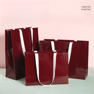Custom Glossy Burgundy Apparel Store Paper Bags with Anchored Red Ribbon - Sturdy Tote Packaging Bag
