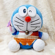 Boneka Doraemon Baju Coklat Boneka Doraemon papan Pink