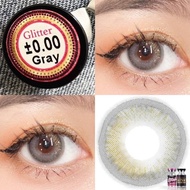 Wink lens : มีกลิตเตอร์ Gitter ตาหวาน สายตาปกติ สีน้ำตาล / สีเทา คอนแทคเลนส์รายเดือน