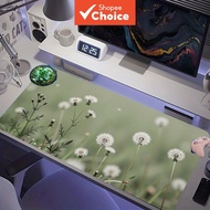 Fresh pastel green dandelion meadow XXL desk pad, soft focus blurred bokeh, white dandelion seeds fl