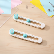 A rotary round knife for cutting photos, journals, and scrapbook pages is a specialized tool designe