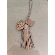 Cream flower rumbayBagcharm by TNA.collection