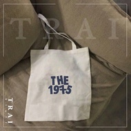 The 1975 White Canvas Band Zipper Totebag
