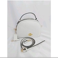 Handbag Sling bag coach Two Spaces full PU lheater Round cake Serena bags mesengger bag size