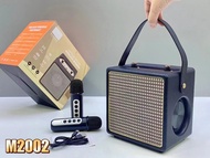 ลำโพงบลูทูธ รุ่นM2002 แถมไมค์ลอย2ตัว รองรับAUX/TF/USB มีสายหิ้วพกพาง่าย เพิ่มหรือลดเสียงได้ ลำโพงบล