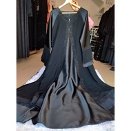 Malika Harer layer Abaya