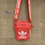 เซ็ตคู่!! Adidas กระเป๋าคาดเอว รุ่น Adicolor Waistb HE9764  /กระเป๋าสะพายข้าง รุ่น AC FESTIVAL BAG HD7165 (ลิขสิทธิ์แท้)