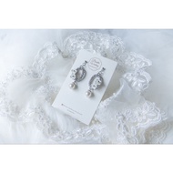 silver loop with white flower earring