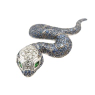 Like new pendant top with 0.35ct diamond and 4.72ct sapphire. 18K white gold with snake motif. Diamo