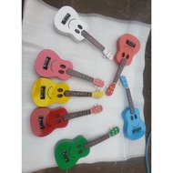 Original wooden ukulele with bonus pick
