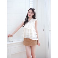 11-354 Cream Tone Sleeveless Shirt With A V-Neck Design With Pleats And Trim At The Neck With Small 