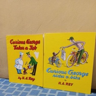 Curious George takes a Job Curious George rides a bike by H.A. Rey