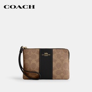 COACH กระเป๋าคล้องมือขนาดเล็กผู้หญิงรุ่น Corner Zip Wristlet In Signature Canvas With Stripe CW854 I