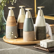 Ceramic soap dispenser and body wash dispenser, refillable liquid bottle, hygienic operation, standa