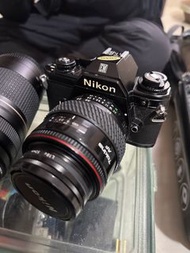 Nikon em