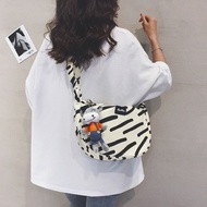 Japanese and Korean Style Niche Canvas Bag Women's 2023 New Summer Zebra Pattern Work Clothing Dumpling Bag Casual All-Match Crossbody Bag