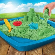 Kinetic sand with moulds and tray.