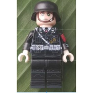 WW 2 German in black uniform with standee plate.(Plastic toy and less than 2 inches) b